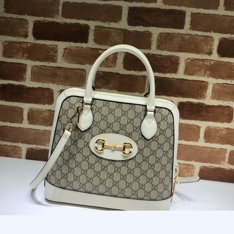 G*u*i top handle bags